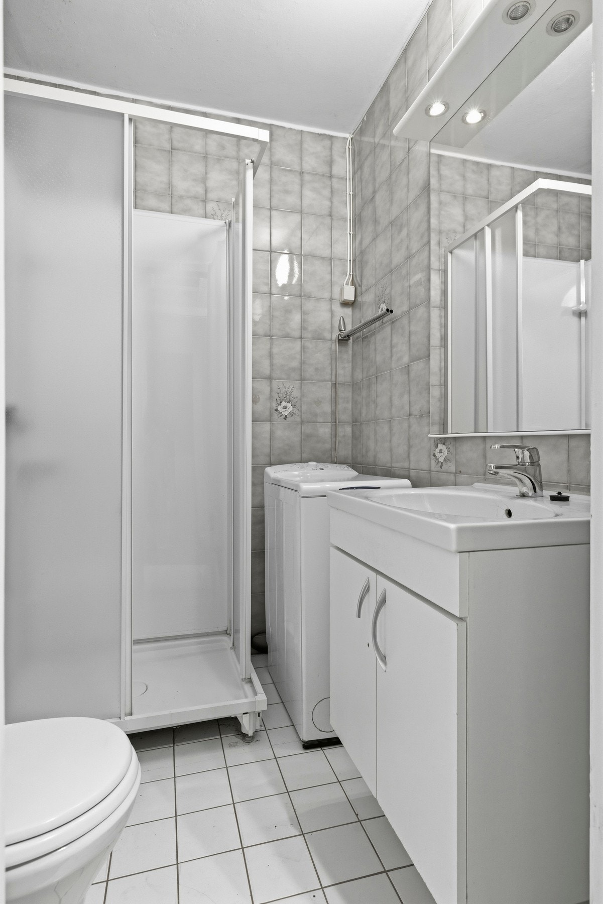 Badet har opplegg for vaskemaskin. Galleribilde
