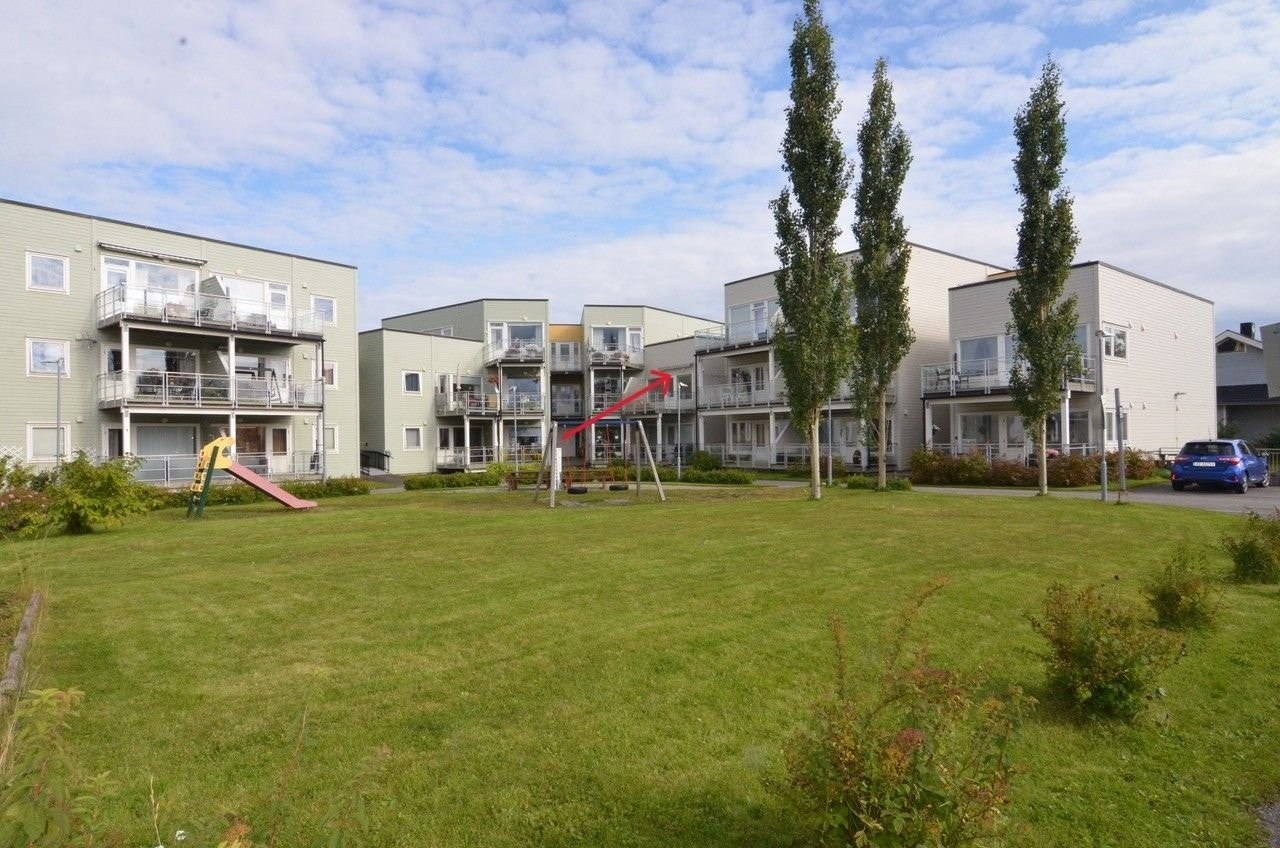 Leilighet avmerket med pil. Galleribilde