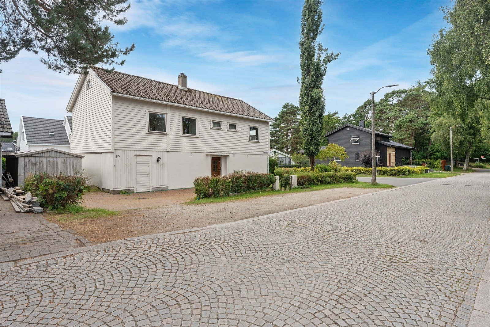 Gode parkeringsmuligheter på egen tomt Galleribilde