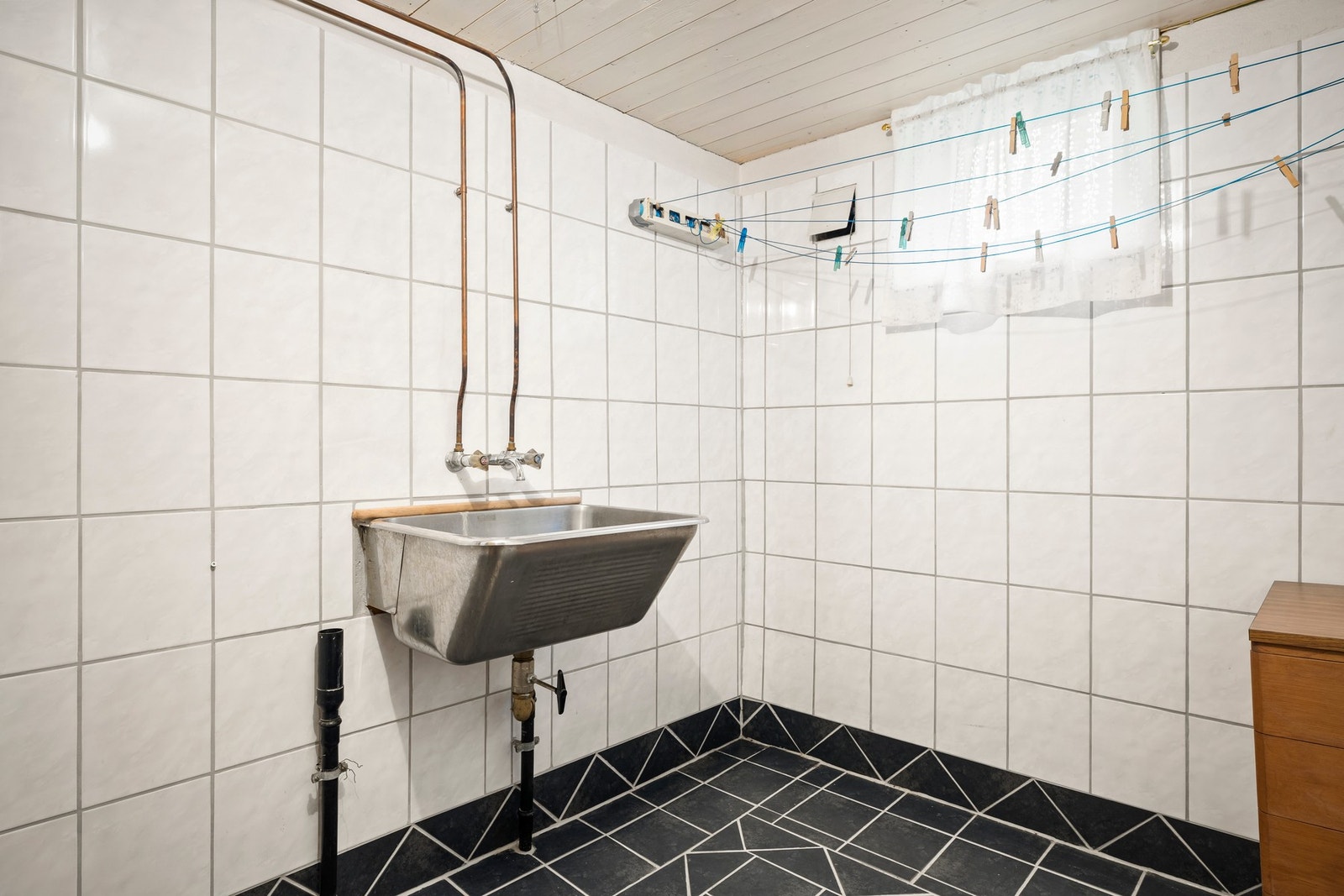 Praktisk og romslig vaskerom. Galleribilde