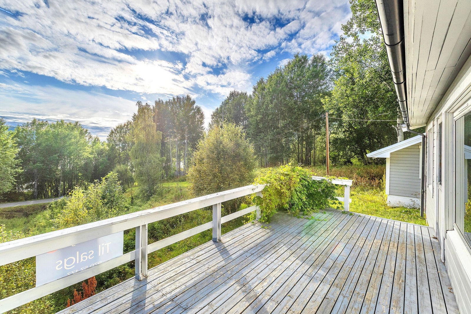 Romslig veranda Galleribilde