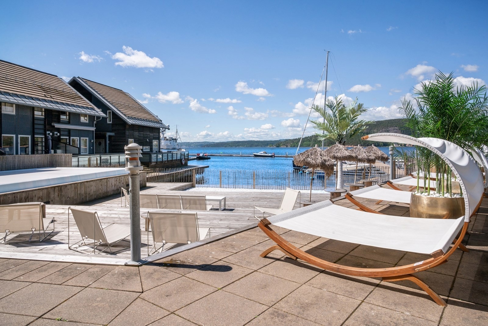 Fellesområdene inkluderer blant annet beach club med mulighet for servering. Galleribilde