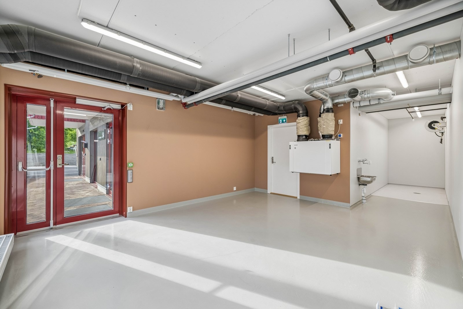 Egen spyleplass for rengjøring av sykkel i tilknytning til sykkelparkeringen. Galleribilde