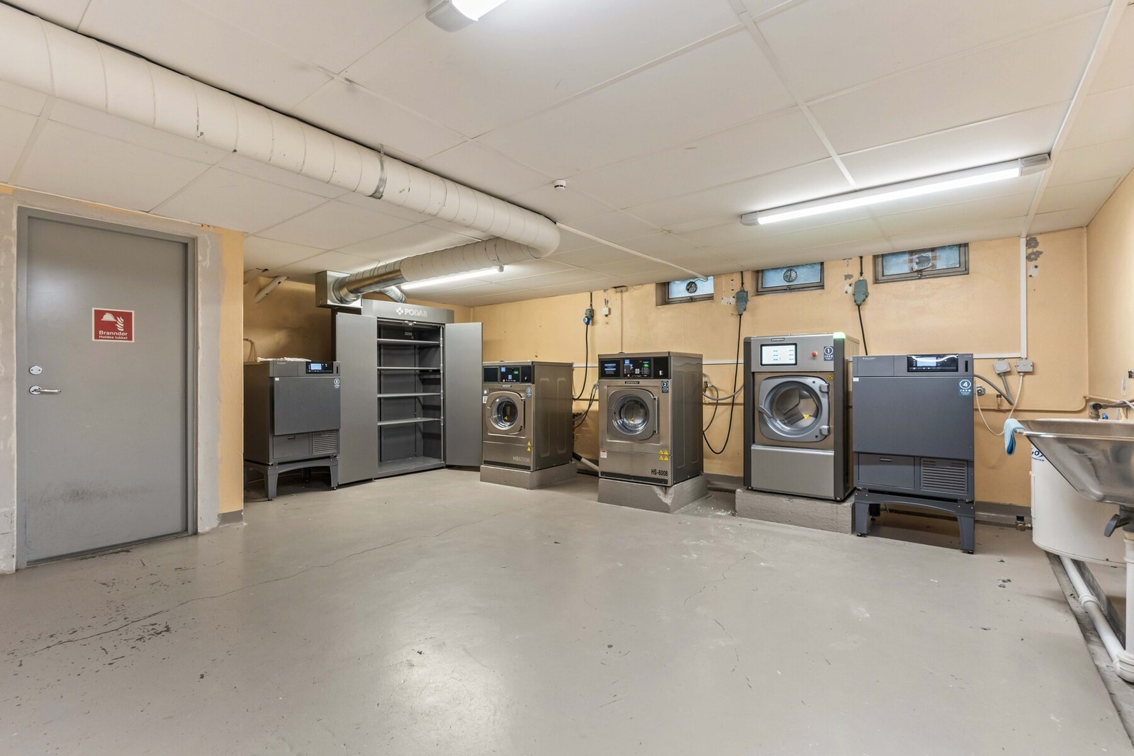 Borettslaget har fellesvaskeri i hver oppgang. Galleribilde