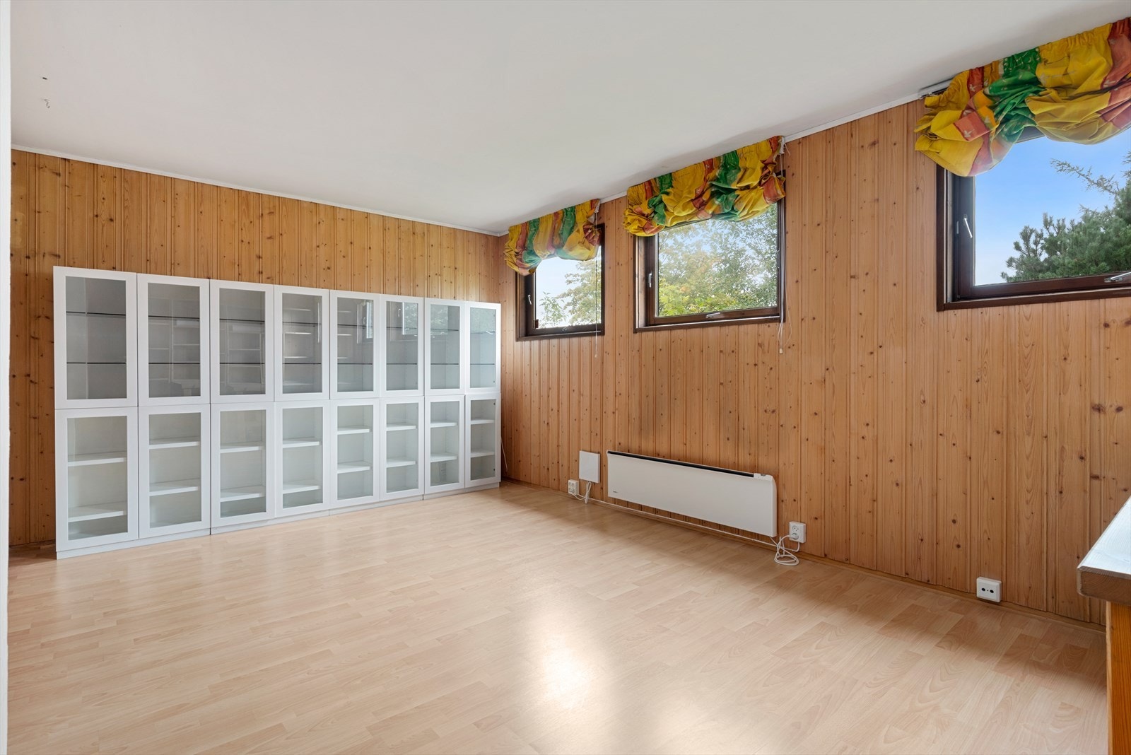 Stue på 18,8 m² i kjelleretasjen. Galleribilde