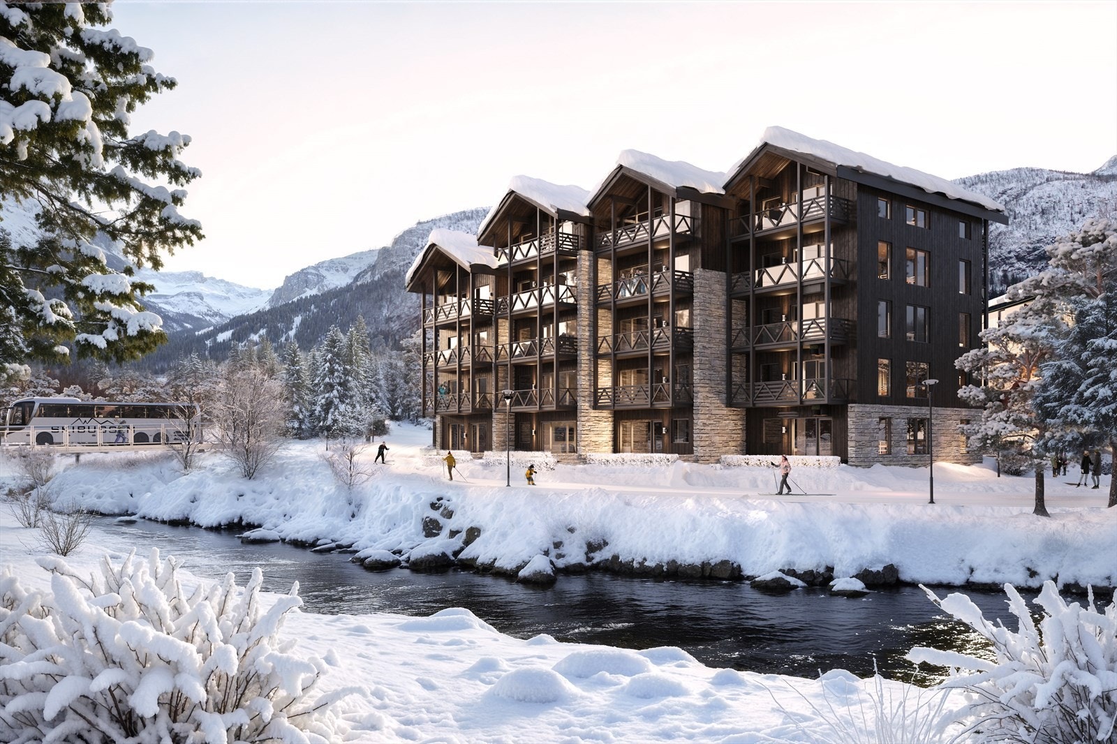 Skogshorn ligger naturskjønt til ved elven og med fjellmassiver som reiser seg på hver side Galleribilde