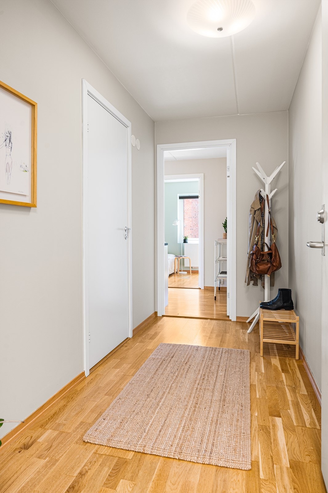 En innbyende entré ønsker deg velkommen inn i ditt nye hjem! Galleribilde