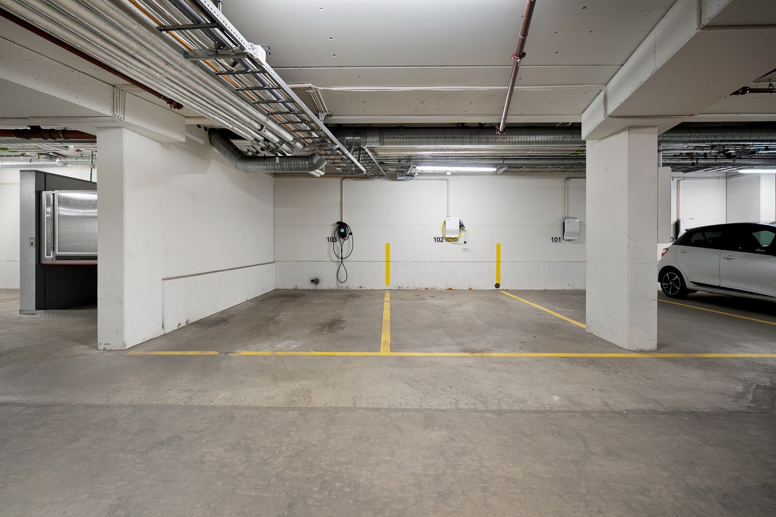 Garasjeplassen som kan kjøpes separat (medfølger ikke ved salg av leiligheten). Galleribilde