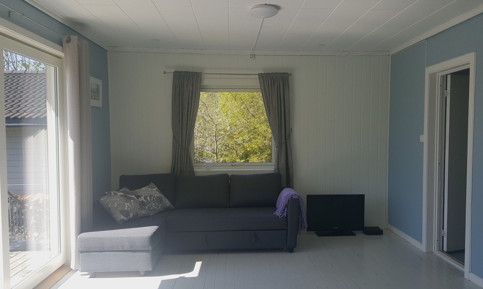 Stue med skyvedør til veranda Galleribilde