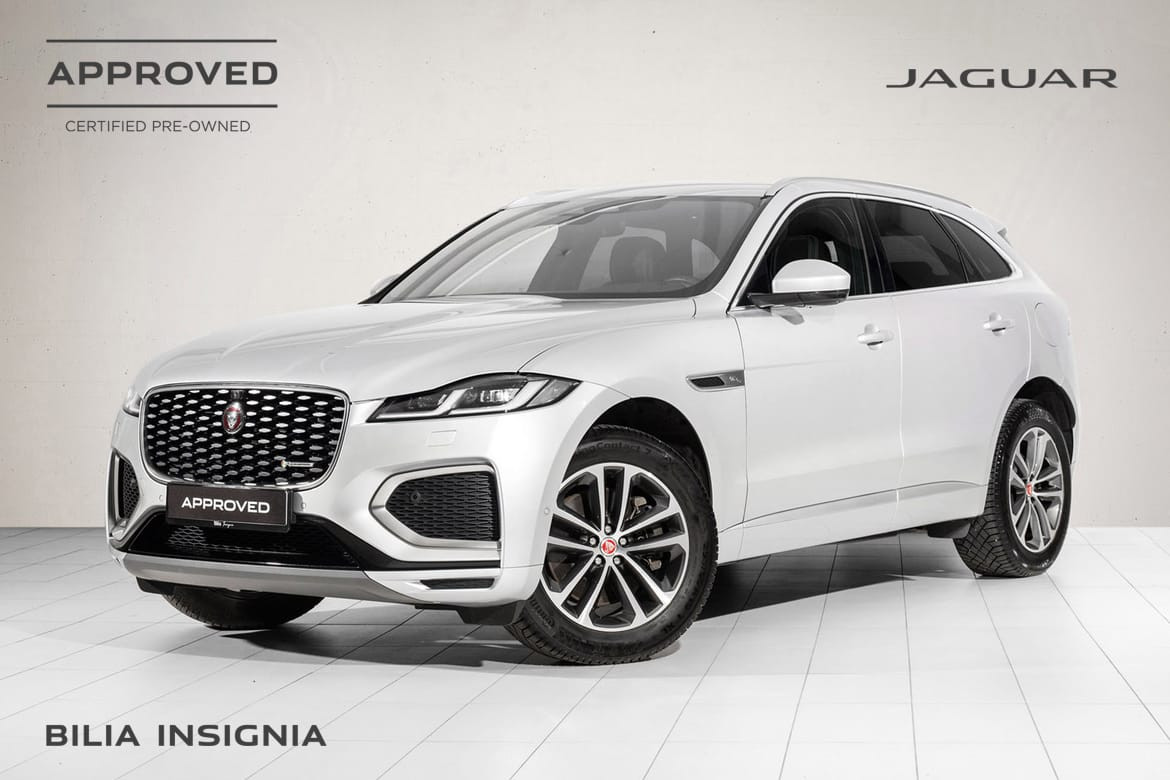 Dynamisk SUV-design – Jaguar F-PACE PHEV i elegant hvit med sportslig front og karakteristisk grill.