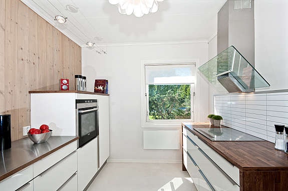 Kjøkkenet er stilig og i en moderne utførsel. Galleribilde