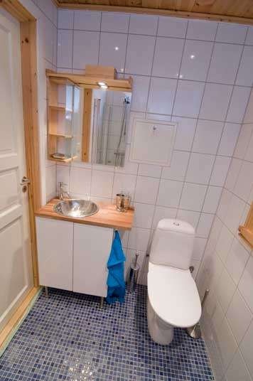 Bad, med dusj og vaskemaskin Galleribilde