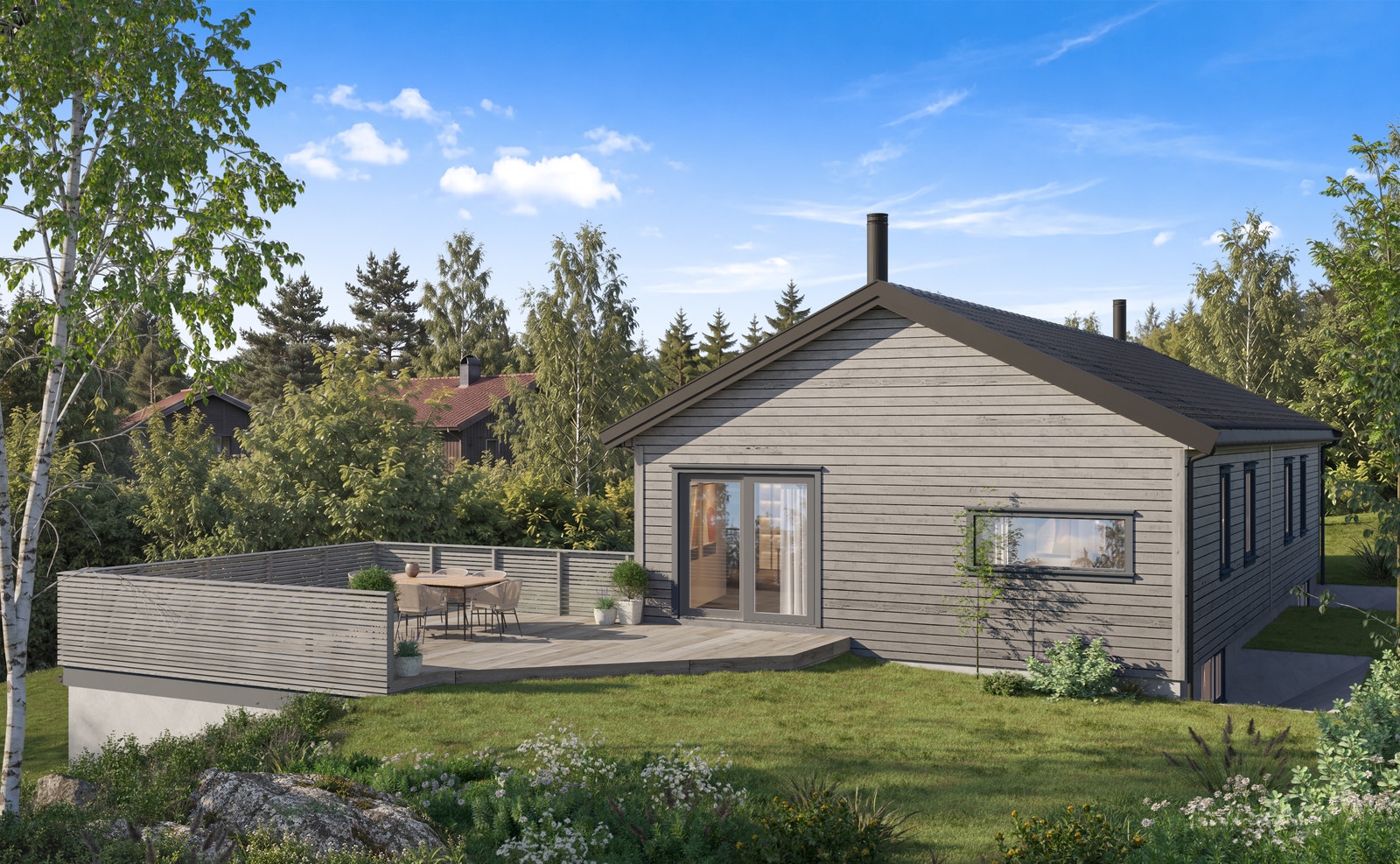 En stor og solrik terrasse er tilknyttet en skjermet hage på baksiden.