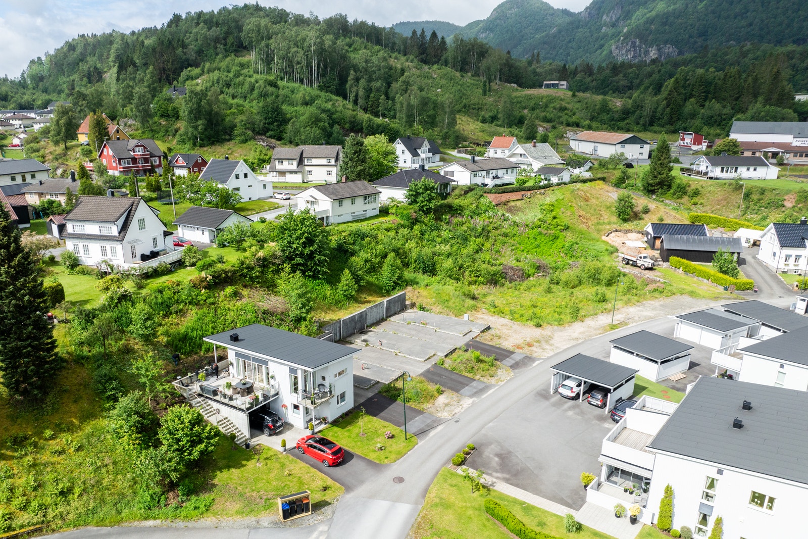 Boligene vil ligge i det grønne feltet midt i bildet