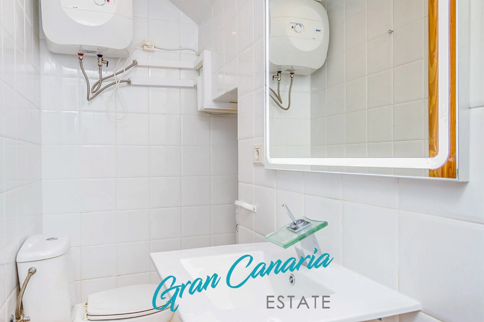 Vaskemaskin rundt hjørnet til høyre Galleribilde