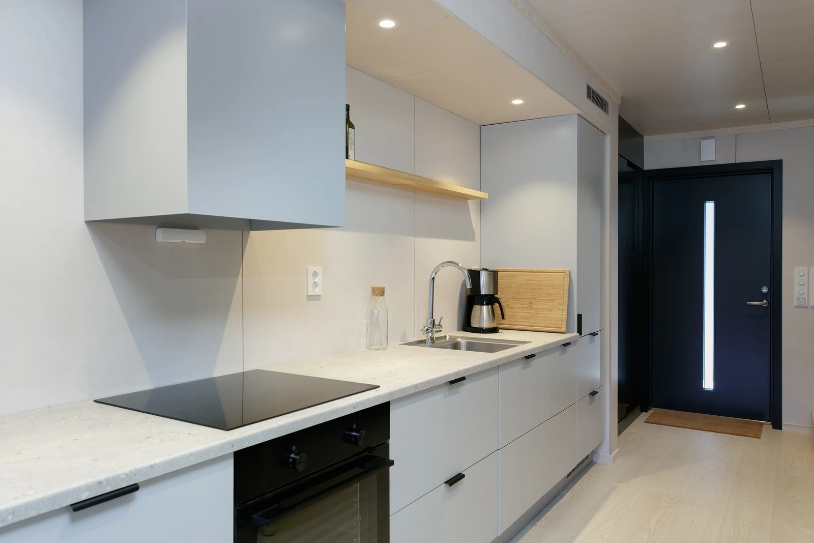 Kjøkkeninnredning fra Sigdal med integrerte hvitevarer Galleribilde