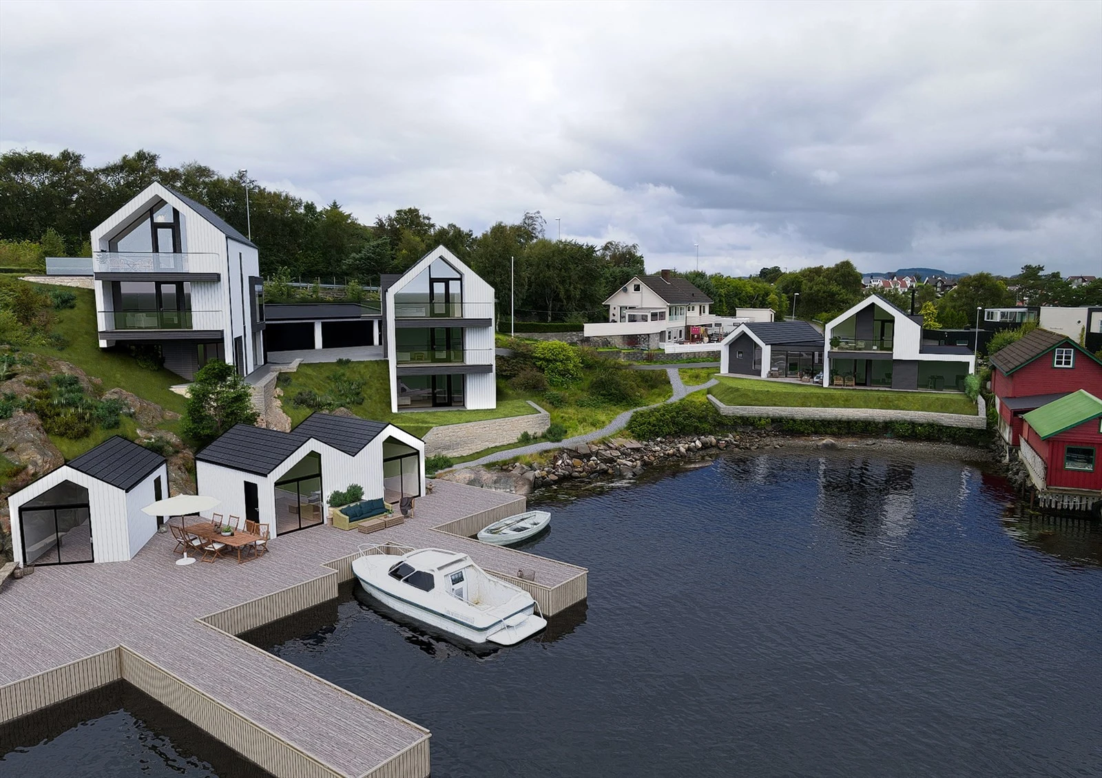 Det er medfølgende brygge og garasje til hver bolig. Mulighet for å kjøpe naust i tillegg. Galleribilde
