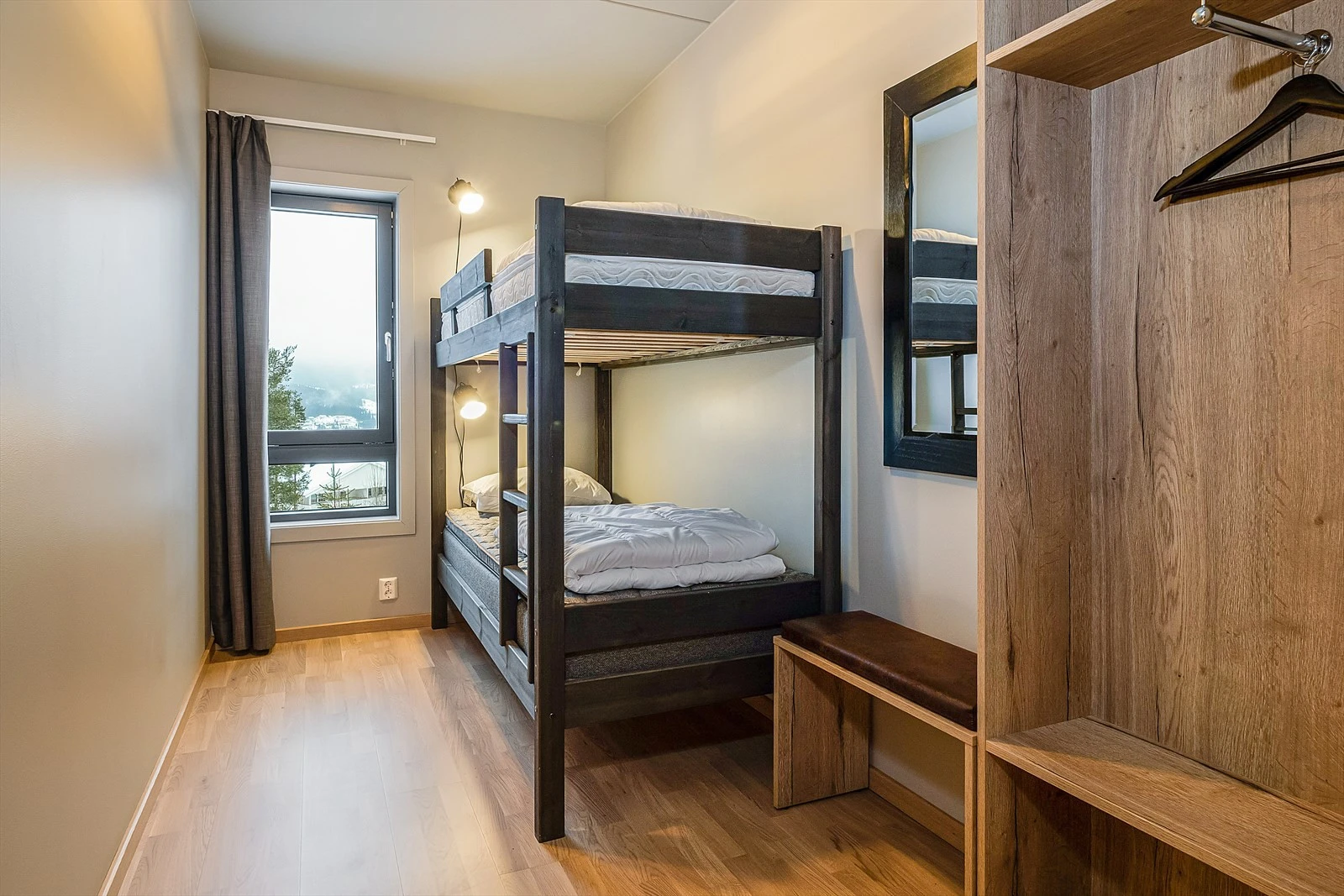 Leilighetens andre soverom er innredet med køyeseng. Galleribilde