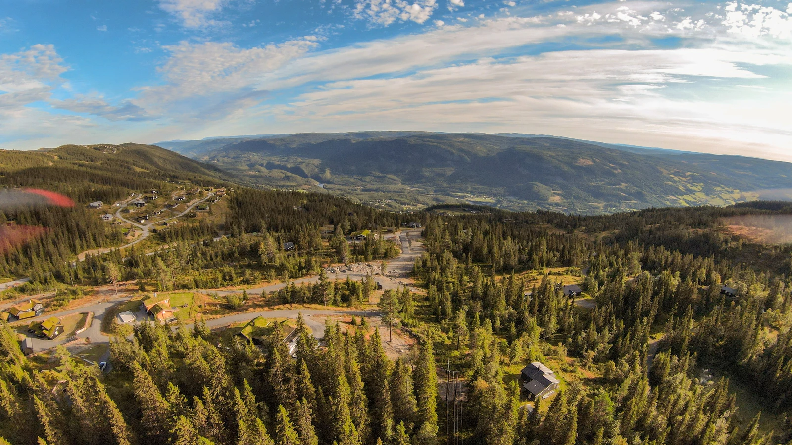 Solvendte tomter med flott utsikt Galleribilde