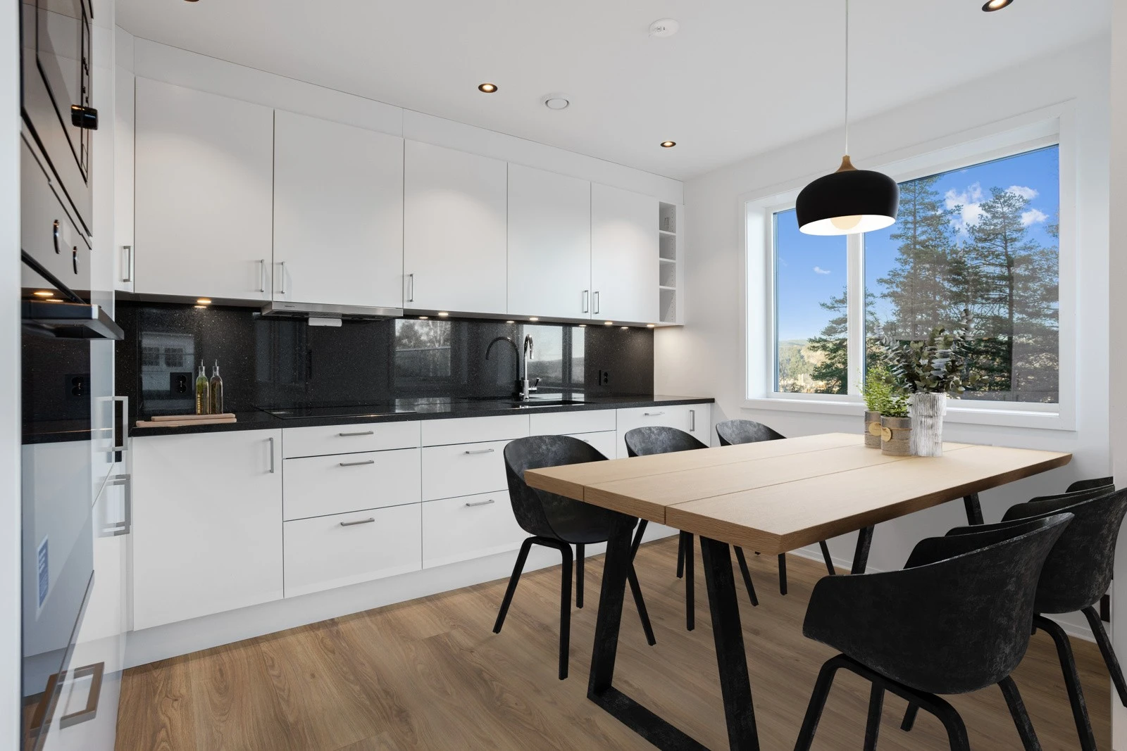 Elegant "Uno Snø" kjøkkeninnredning med fullintegrerte Electrolux hvitevarer | god spiseplass i kjøkken ved vinduet | stein/granitt benkeplater Galleribilde