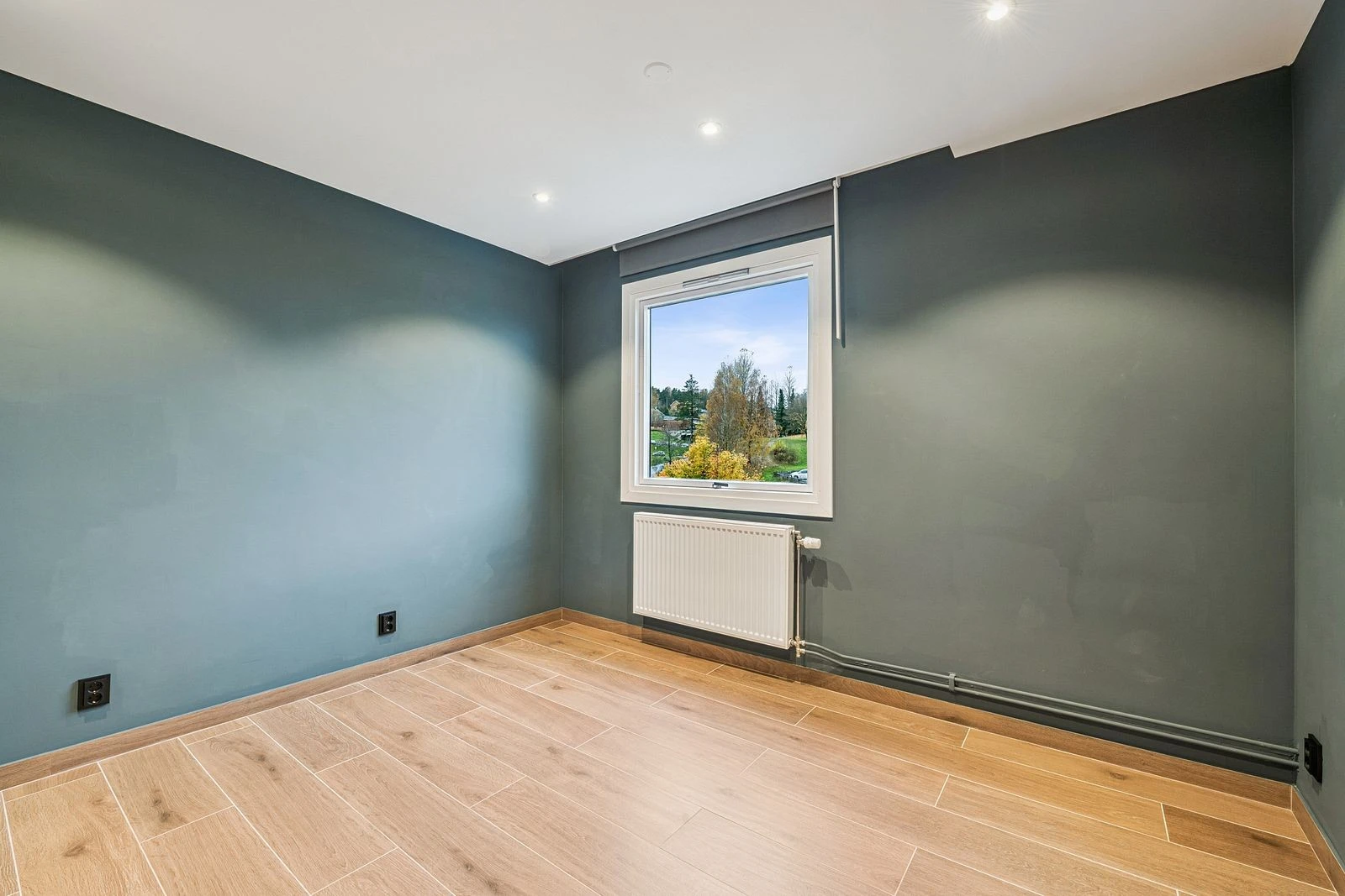 Hovedsoverommet gir en følelse av ro og komfort.