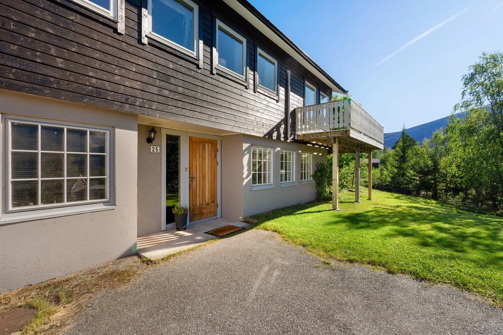 Hyggelig inngangsparti som ønsker deg velkommen inn Galleribilde