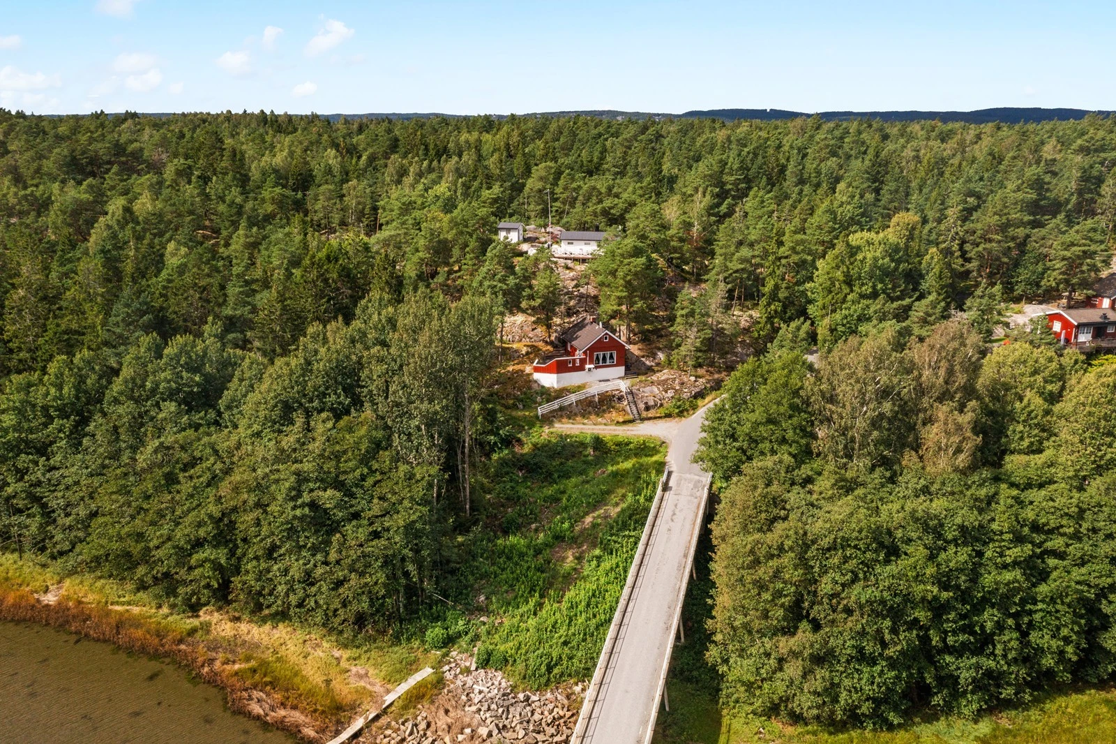 I forbindelse med fornyingen vil bli bygget en midlertidig bru, som delvis vil ligge på deler av tomten til den vurderte eiendommen. Tomten skal tilbakeføres når arbeidene med byggingen av den nye brua er ferdigstilt Galleribilde