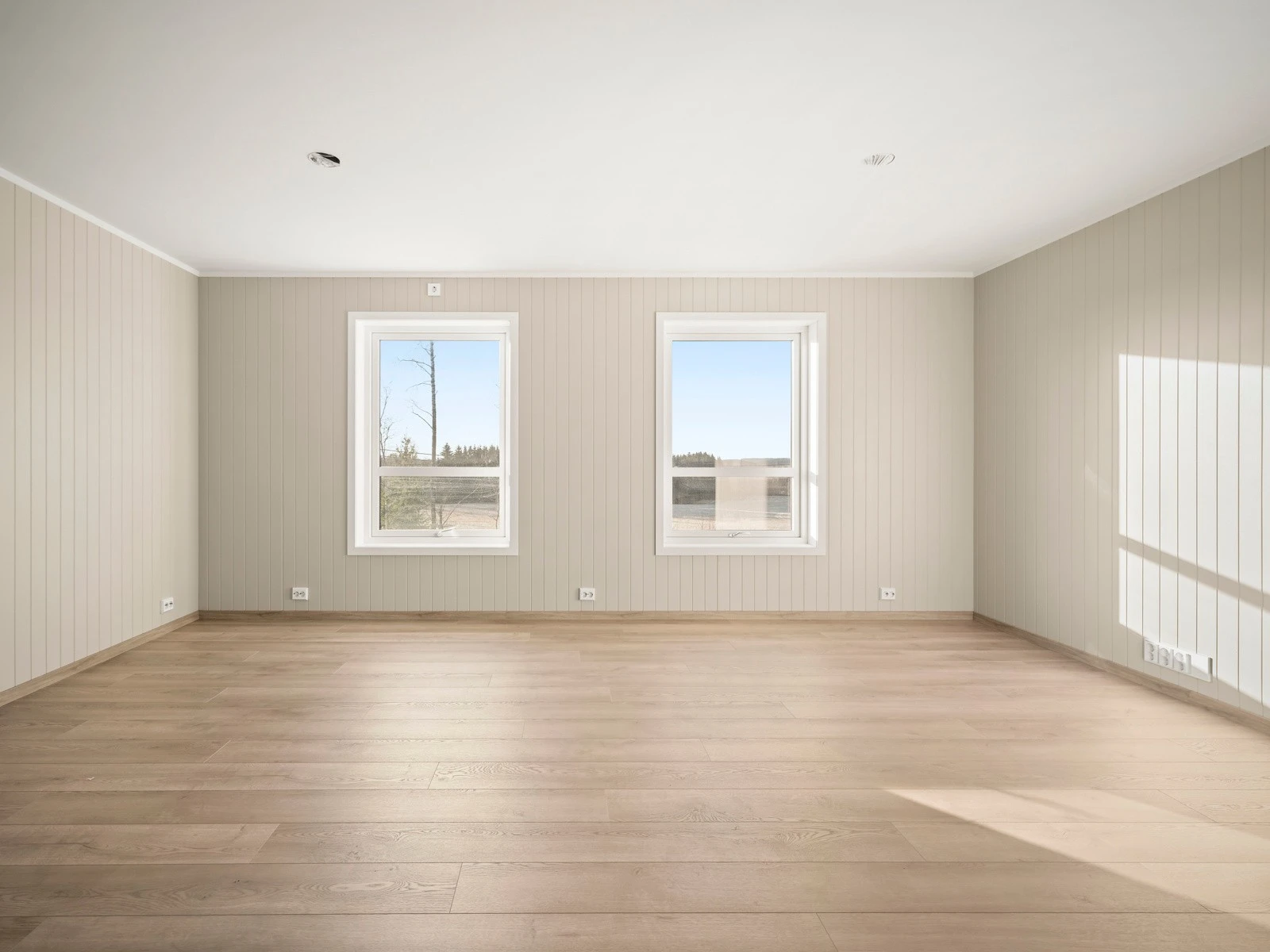 Romslig stue i utleiedelen. Galleribilde