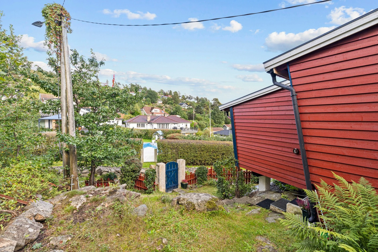 Skrånende naturtomt. Galleribilde