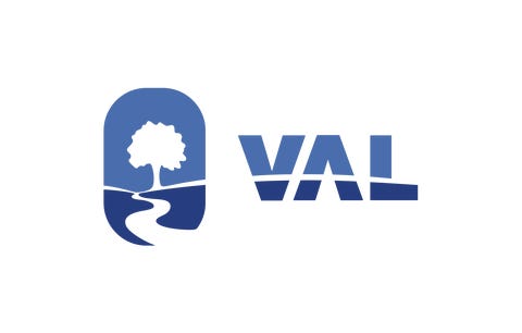 VAL SKOLER AS logo