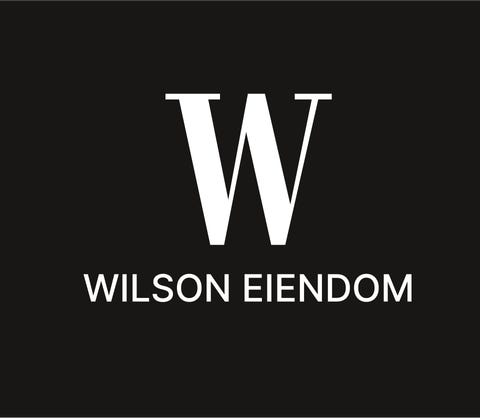 Wilson Eiendom AS logo