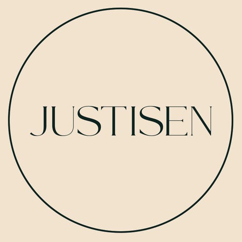 Justisen Drift AS logo