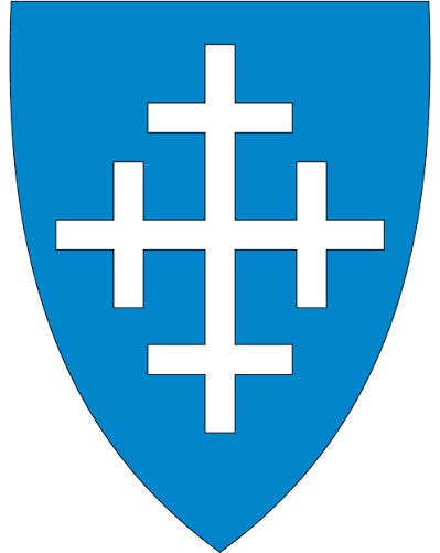 Raarvihken tjïelte / Røyrvik kommune logo