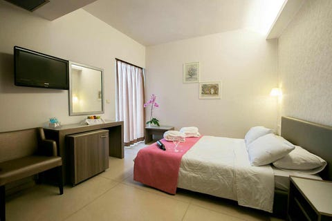 Astron Hotel 4 av 12