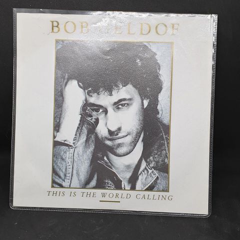 VINTAGE LP/SINGEL/VINYL AV BOB GELDOF / THIS IS THE WORLD CALLING 