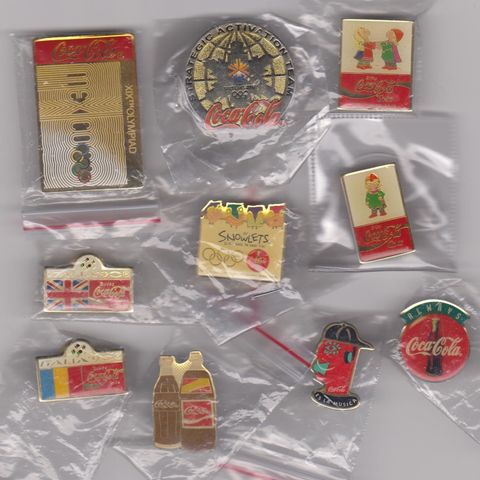 Lot med 10 forskjellige Coca-Cola pins