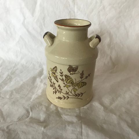 # Liten, nostalgisk vase formet som et melkespann