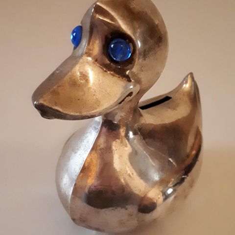 SPESIELL ELDRE "DUCK" SPAREBØSSE. SILVER PLATED ON BRASS