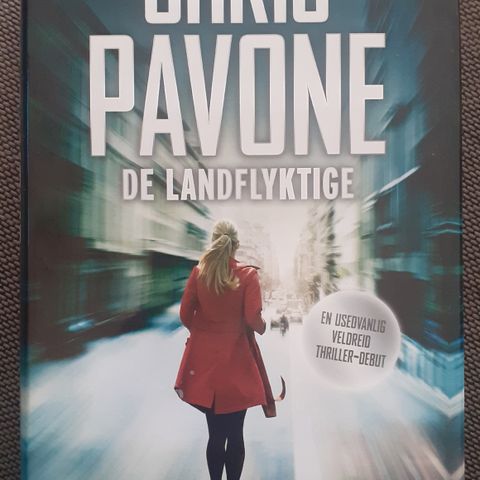 DE LANDFLYKTIGE - Chris Pavone. NY. IKKE LEST! EN MÅ LESES BOK!