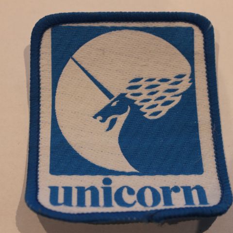 Nytt og ubrukt Unicorn dart tøymerke.