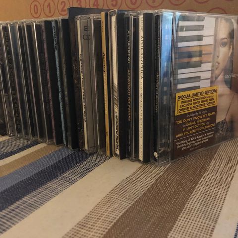 CD-samling 80stk+ (rock/metal, progrock, pop/vise) +noen DVDer