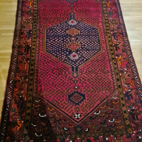 Håndknyttet  persisk  teppe