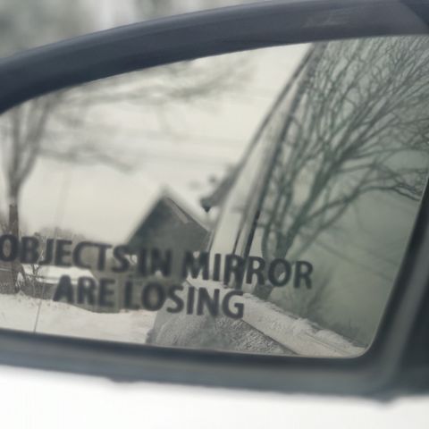 Objects in mirror are losing Sticker