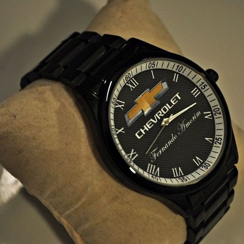 Amcar klokker med  egen logo/navn preget på uret