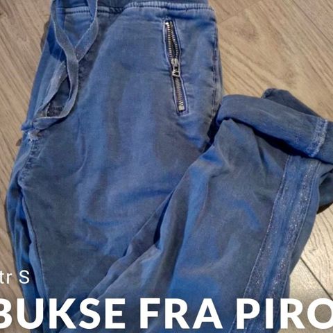 Dueblå Piro jeans med knyting i livet og glitter striper str S