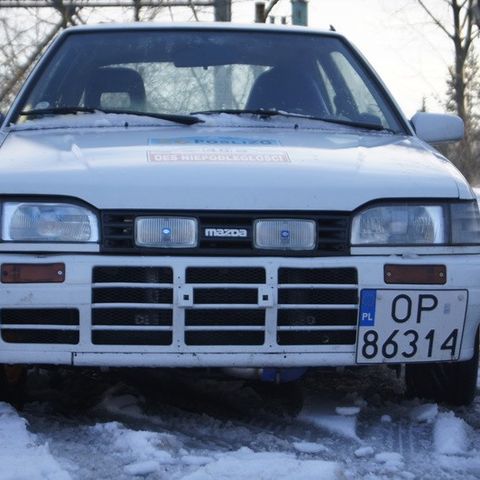 Kjøpes: Grill med lykter for Mazda 323 BF, 87-89-modell