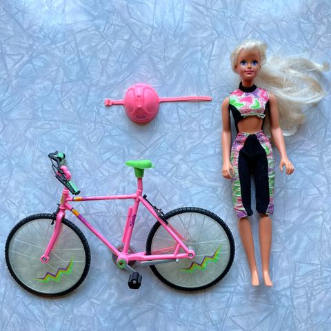 Sindy-dukke med sykkel