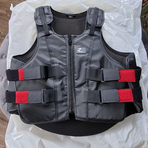 Ride vest.  Rytter