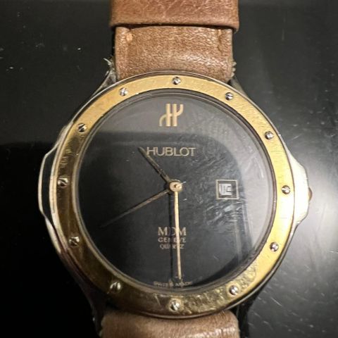 Hublot klokke med skinnreim