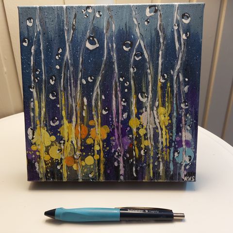 Regndråper i blått maleri
